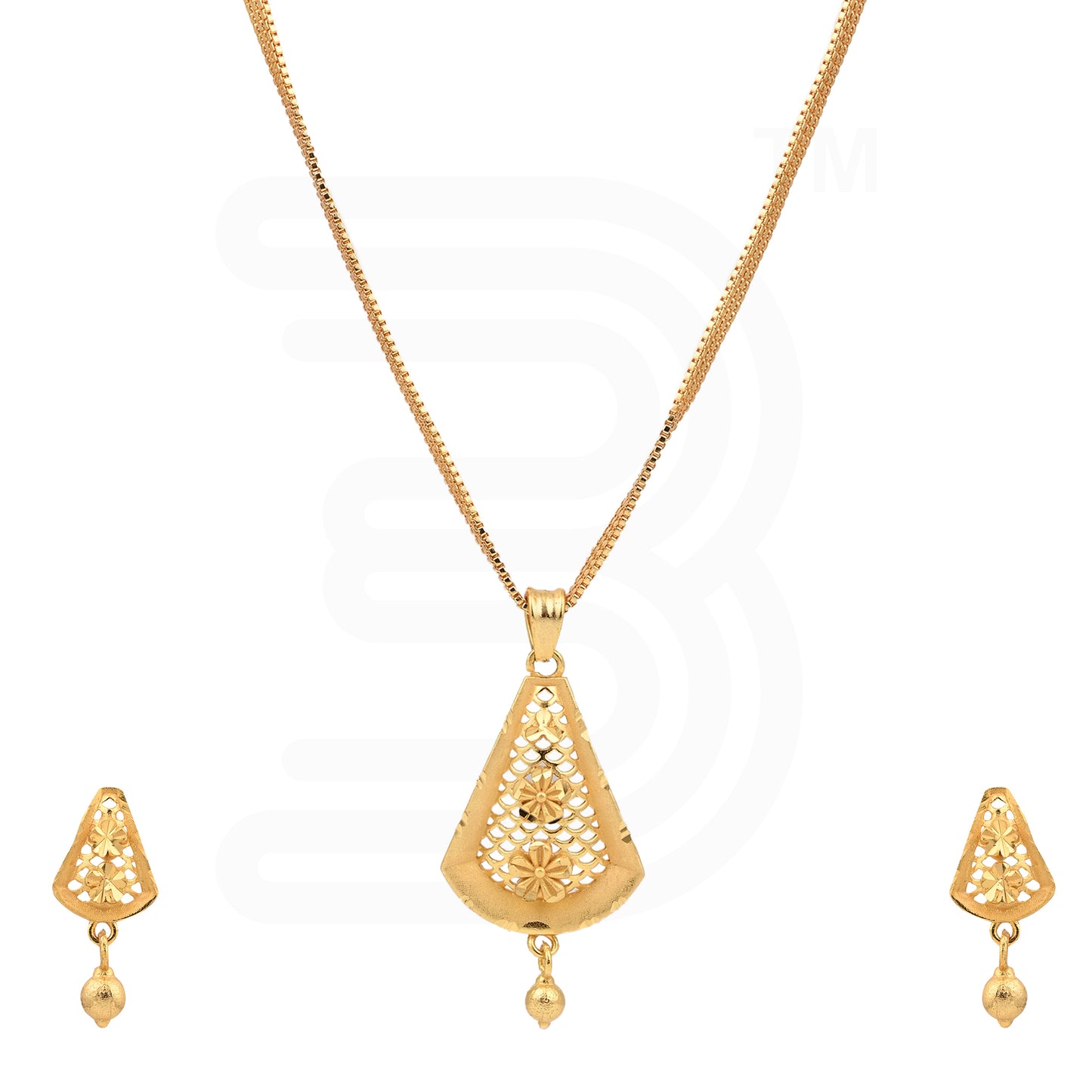 Gold necklace and earrings set on a white background